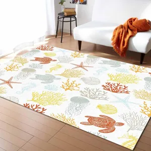 Marine motif living room rug detail, showcasing ocean print and cozy home decor style.