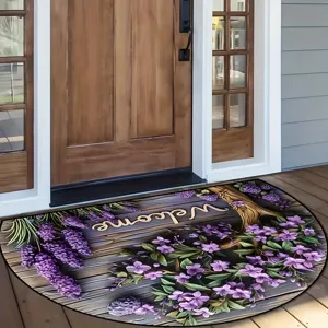 Detail view of the half-round floral doormat with welcome text placed at the wooden porch.