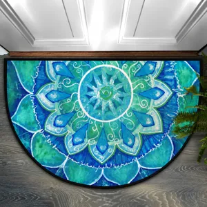 Detailed view of a half-circle doormat with blue mandala pattern for entryway use.