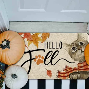 Autumn Thanksgiving doormat featuring a cute cat in a scarf and pumpkins for entryway decor.