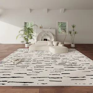 Modern cream style area rug with abstract black dash pattern for living room bedroom floor.