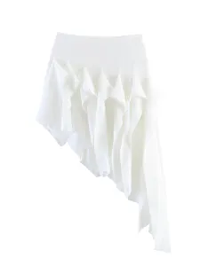 Close-up detail view of white asymmetric skirt, flowing ruffle hem, elegant drape design.