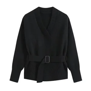 Black V-neck knitted sweater detail, featuring long sleeves and an adjustable fabric belt.