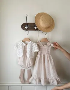 Baby girl summer clothing set featuring lace cardigan, striped romper and smocked strap dress.