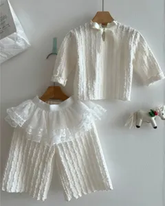 Cute baby girls autumn clothing set, white jacquard long sleeve top and lace wide leg pants.