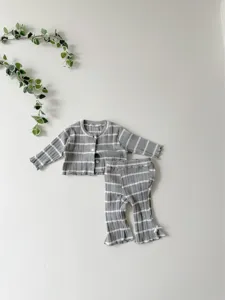 Ribbed baby cardigan and flared pants detail, soft texture and cute button bow design.