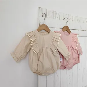 Cute baby girl long sleeve romper with ruffled lace trim, soft cotton infant bodysuit.