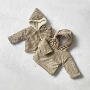 Infant winter fleece hooded coat detail view, cozy plaid and striped reversible baby outerwear.