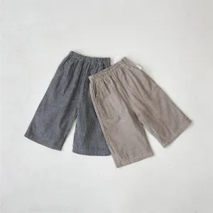 Detail close-up view of children cotton casual striped pants, vintage toddler trousers