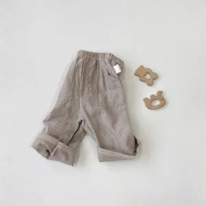 Infant cotton striped casual pants detail, retro style with pockets and rolled cuffs.