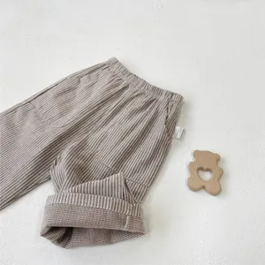 Comfortable baby cotton casual pants with vintage stripes and large pockets for toddlers daily wear.