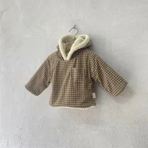 Detail shot of baby winter brown plaid sherpa-lined hooded jacket outerwear for infants