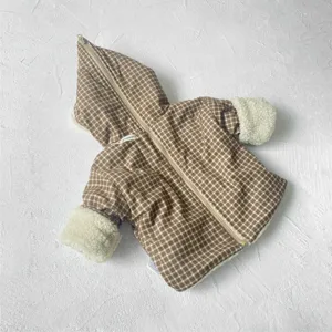 Detailed view of baby winter hooded plaid jacket featuring cozy fleece lining and warm cuffs.