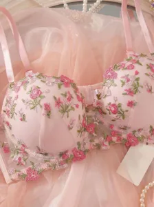 Pink floral embroidered french bra close up detail showcasing delicate sheer mesh fabric.