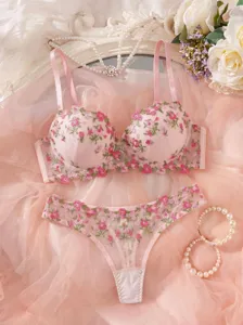 Pink floral embroidered French bra and thong lingerie set, sheer mesh delicate intimate apparel.
