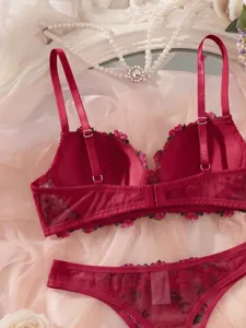 Detailed view of the gorgeous pink floral embroidered French bra and panties set.