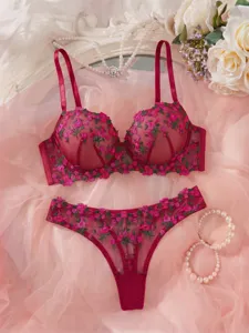 Detailed view of the pink floral embroidered mesh lingerie set, showcasing exquisite details.