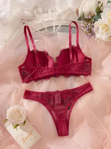 Stunning French floral embroidered bra and thong lingerie set in elegant pink mesh style.