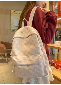 Casual woven checkerboard backpack for women and students, large capacity daily school bag.