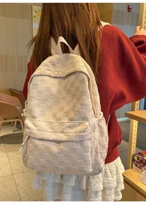 Casual large capacity checkerboard beige backpack for school students and daily travel style.
