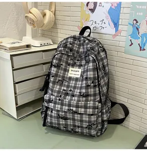 Casual black and white plaid backpack for student girls, stylish Japanese style school bag.