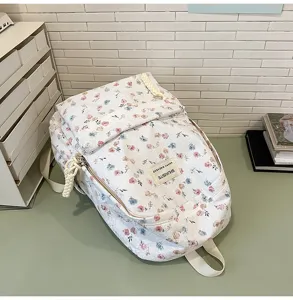 Detailed view of the Japanese style fresh floral backpack, cute white daypack for daily.