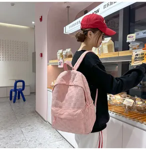 Pink checkered backpack for women, casual cute school bookbag for girls and college students.