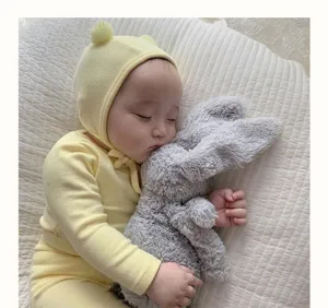 Cute baby spring romper set with high waist pants and matching bonnet for daily wear.