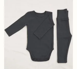 Baby long sleeve bodysuit and high waist pants set detail view in dark gray breathable cotton.