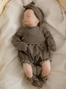 Infant ribbed long sleeve top and shorts set detail, cozy brown cotton baby loungewear.