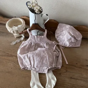 Vintage baby girl cotton embroidered strap romper set with matching hat and tights.