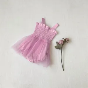 Pink baby girl summer smocked ruffle strap mesh tutu romper detail view, soft cotton dress.