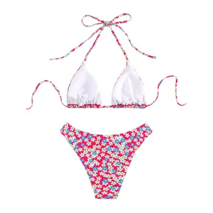 Gedetailleerd overzicht dames bloemen bikini, roze margriet patroon, comfortabele voering.