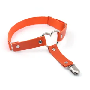 Orange leather heart leg ring garter strap detail view for alternative fashion style.