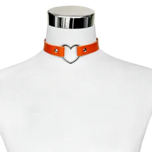 Detailed view of the orange PU leather heart choker necklace, showing metal ring and rivet details.