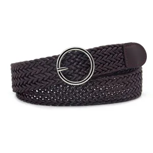 Close-up view showing the exquisite braided texture and silver round buckle of the women's vintage belt.