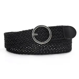 Close-up of black braided women belt featuring a stylish round silver metal buckle.