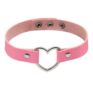 Pink PU leather heart choker necklace detail, metal heart ring pendant accessory close-up.