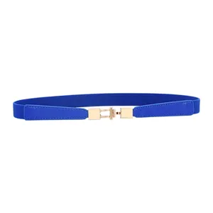 Detailed view of fashionable blue elastic skinny waist belt featuring gold metal buckle.