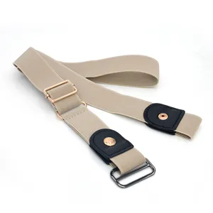 Detail view of buckle-free elastic invisible belt, adjustable lazy stretch belt in khaki.