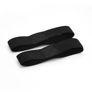 Detailed close-up of black elastic high heel straps, featuring secure cross-stitched design.