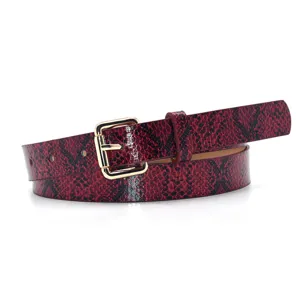 Detail view of red snakeskin pattern women belt with shiny gold square buckle for jeans dresses.