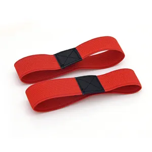 Detail view of red elastic shoe straps with black patch, anti-slip bands for high heels.