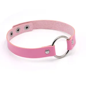 Pink leather punk choker necklace with metal ring and snap button closure for women.