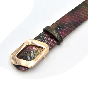 Fashion belt detail showing unique rhombus metal buckle and gradient snakeskin texture leather.