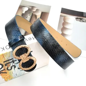 Ceinture femme en cuir PU motif serpent bleu avec boucle metallique doree forme 8 mode accessoire
