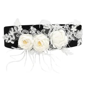 Women elastic waist belt with elegant white lace floral embroidery and feather decoration.