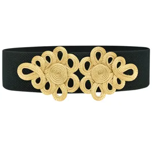 Detailed view of the black elastic waist belt featuring an exquisite gold Chinese knot buckle.