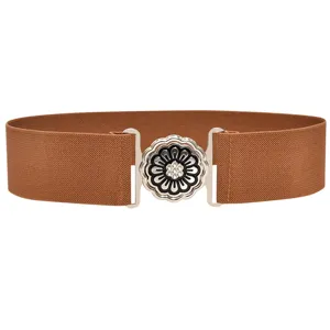 Detailed view of a brown elastic waist belt with a silver metallic flower buckle, stylish accessory.