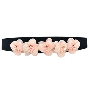 Black elastic waist belt featuring cute pink chiffon flowers, perfect dress accessory.